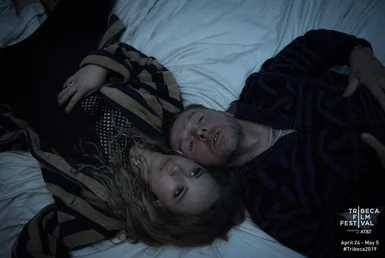 Lost Transmissions film poster with two people lying beside each other.